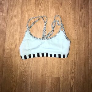 Mint green lululemon sports bra with black details
